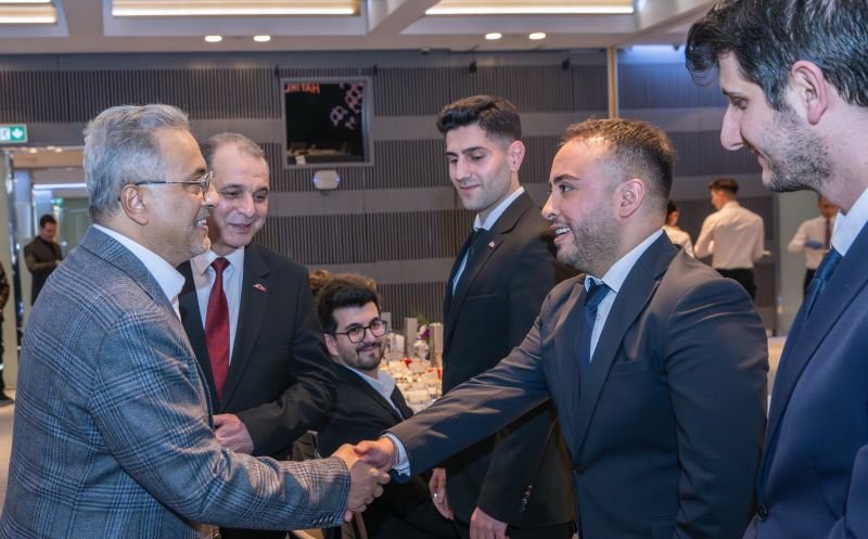 Business professionals networking at an industry event